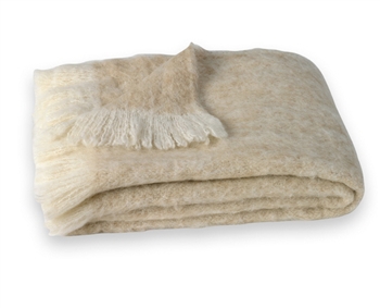Sand: Hand Brushed Alpaca Throw.  51" x 72". Crafted from naturally occurring colors so no dyes are needed, this Brushed Alpaca Throw is silky soft, naturally repels dirt and retains heat. Alpaca fiber is non-irritating and hypo-allergenic.